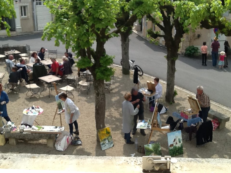 image: les peintres sont sur la place